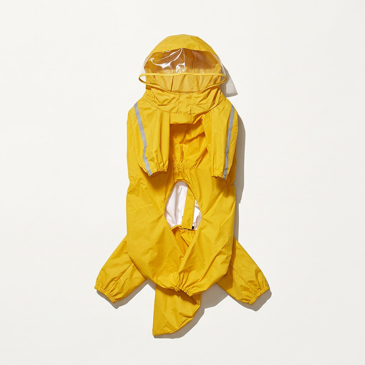 Yellow rain suit laid flat