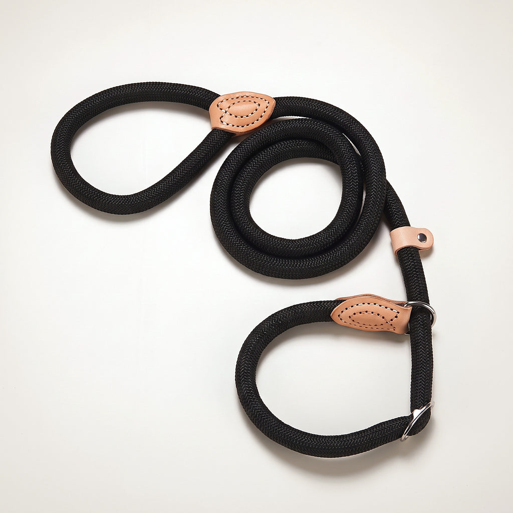 Black braided rope slip lead with leather stopper and metal ring
