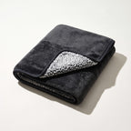 Grey waterproof dog blanket with plush top and sherpa underside