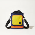 Navy crossbody dog treat bag with yellow pocket