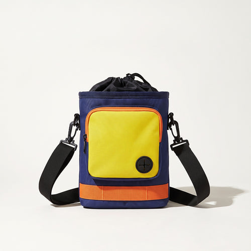 Navy crossbody dog treat bag with yellow pocket