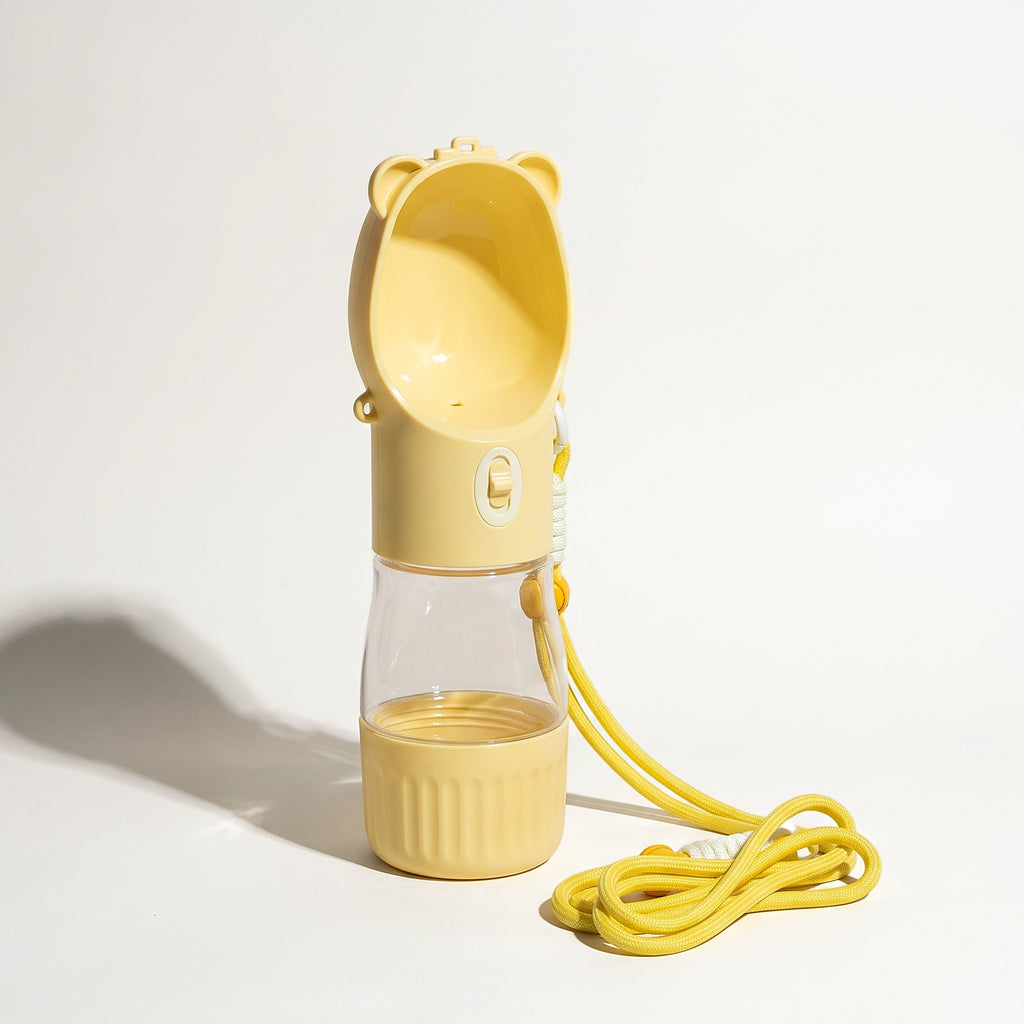 Yellow 2-in-1 dog water bottle with food cup and rope strap