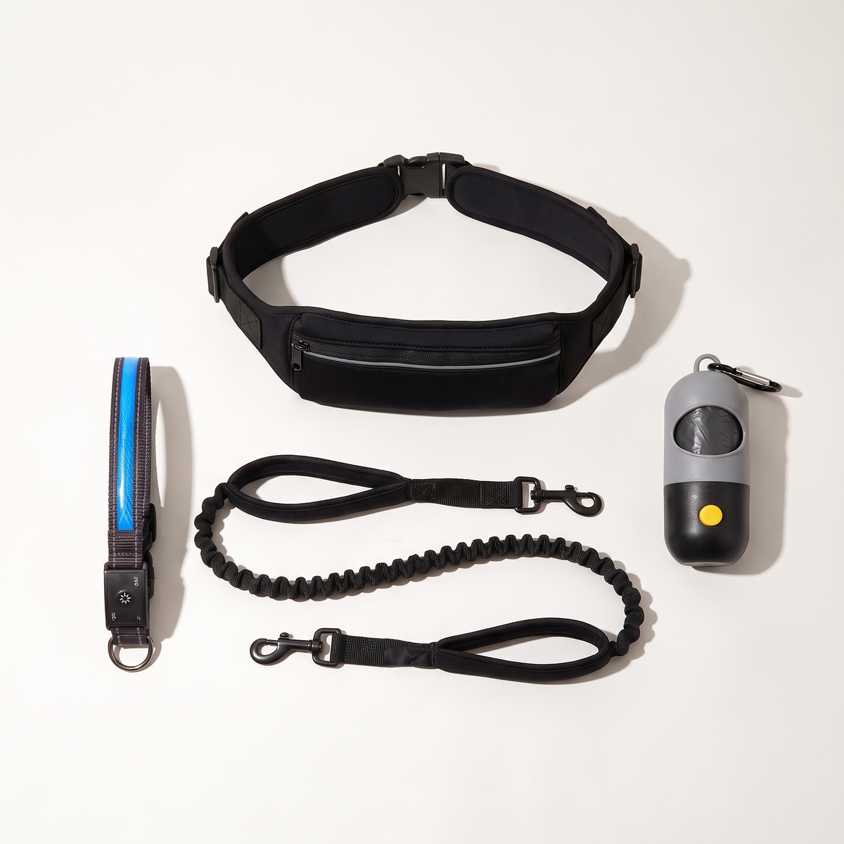 Night Walk Starter laid out: hands-free waist belt with bungee leash, LED collar and LED bag holder