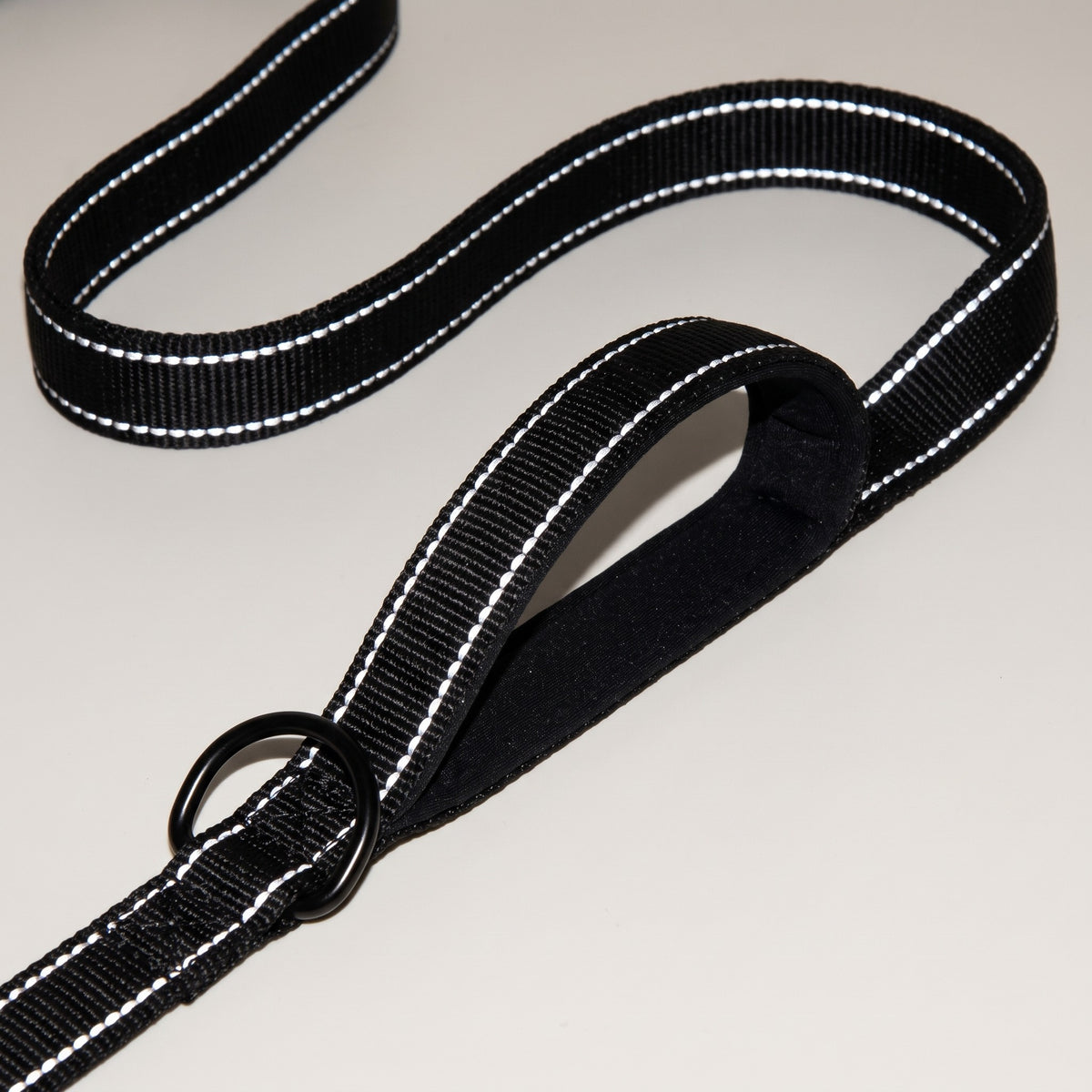 Reflective stitching glowing in flash light