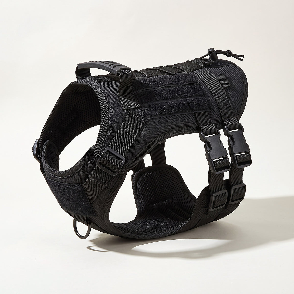Black dog harness with padded grab handle, chest D-ring and quick-release buckles