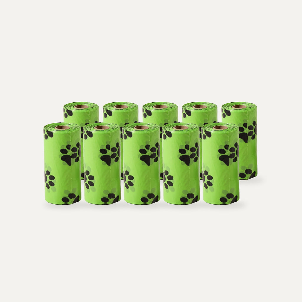 Ten green poop bag refill rolls with paw print
